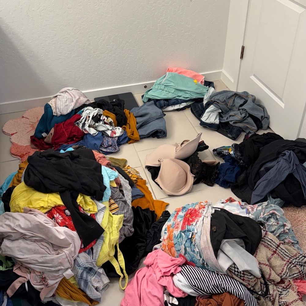 Mixed Women's Clothing Pile with Beige Bra and Colorful Tops